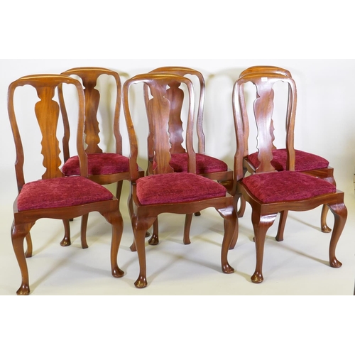 1013 - A set of six mahogany dining chairs with shaped backs and drop in seats