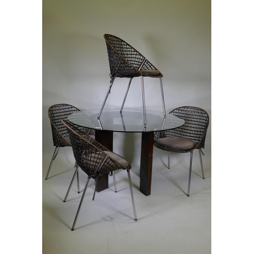 1017 - A John Lewis dining table with faux leather base and glass top, and four cane tub chairs with faux l... 