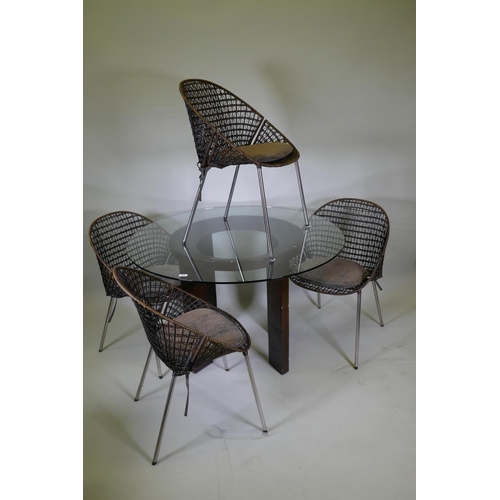 1017 - A John Lewis dining table with faux leather base and glass top, and four cane tub chairs with faux l... 