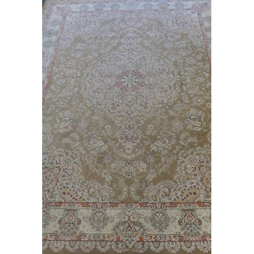 1020 - A large fine woven Iranian carpet with bespoke floral design on a buff coloured ground, 300 x 390cm