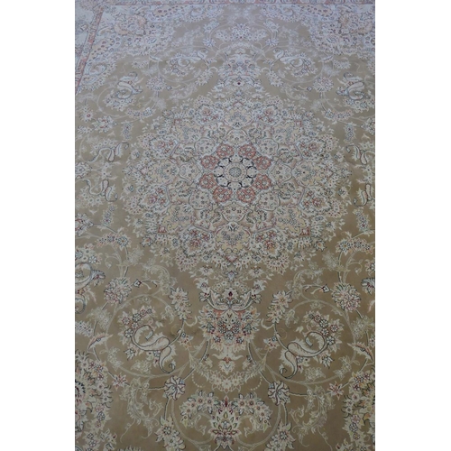 1020 - A large fine woven Iranian carpet with bespoke floral design on a buff coloured ground, 300 x 390cm