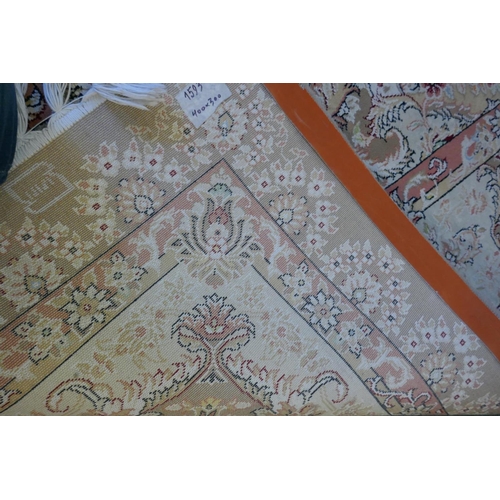 1020 - A large fine woven Iranian carpet with bespoke floral design on a buff coloured ground, 300 x 390cm