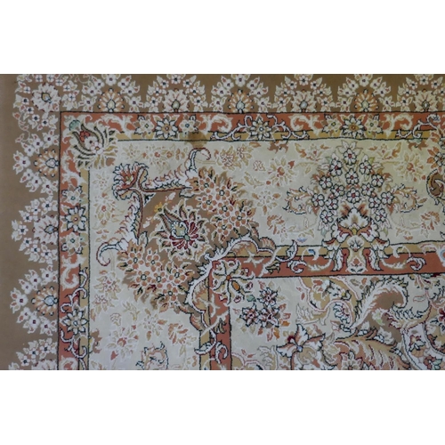 1020 - A large fine woven Iranian carpet with bespoke floral design on a buff coloured ground, 300 x 390cm