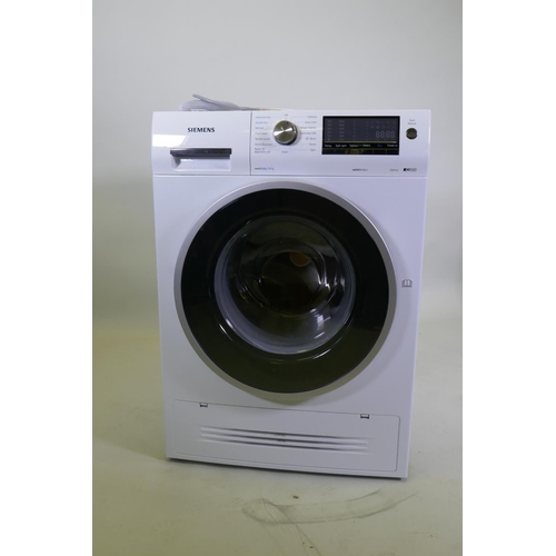 1030 - A Siemens Vario Perfect iQ500 washer dryer, nearly new and virtually unused