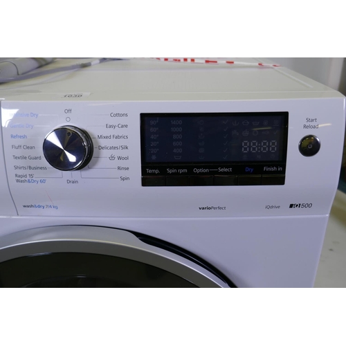 1030 - A Siemens Vario Perfect iQ500 washer dryer, nearly new and virtually unused