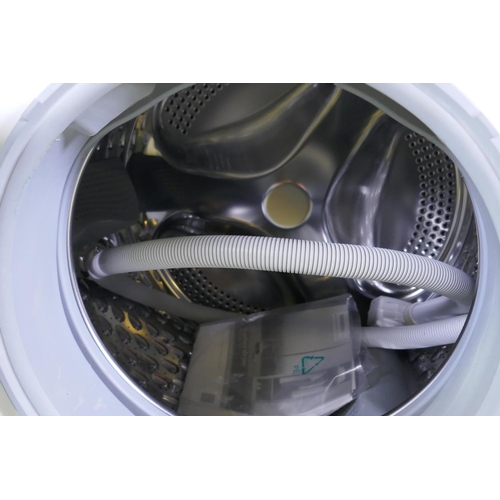 1030 - A Siemens Vario Perfect iQ500 washer dryer, nearly new and virtually unused