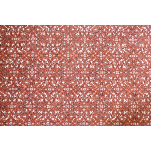 1037 - A terracotta ground wool pile Turkish Erikeh rug with all over design,200 x 290cm