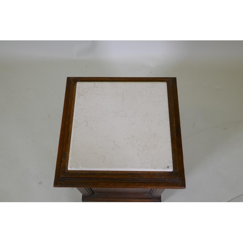 1043 - An oak pedestal with tile top, 38 x 38cm, 55cm high