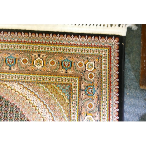 1045 - A deep black ground fine woven full pile Iranian runner with multicolour design, 100 x 408cm