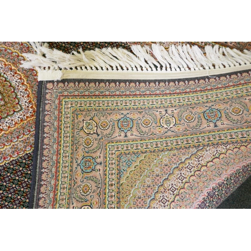 1045 - A deep black ground fine woven full pile Iranian runner with multicolour design, 100 x 408cm