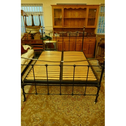 1047 - A John Lewis metal and brass king size bed, 150 x 210cm