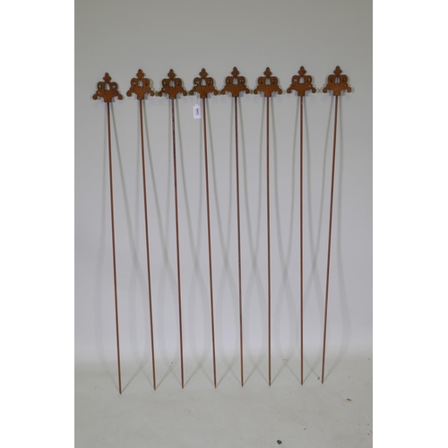 1049 - A set of eight cast iron gothic style plant stakes with fleur de lis, 108cm high