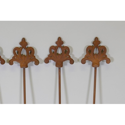 1049 - A set of eight cast iron gothic style plant stakes with fleur de lis, 108cm high