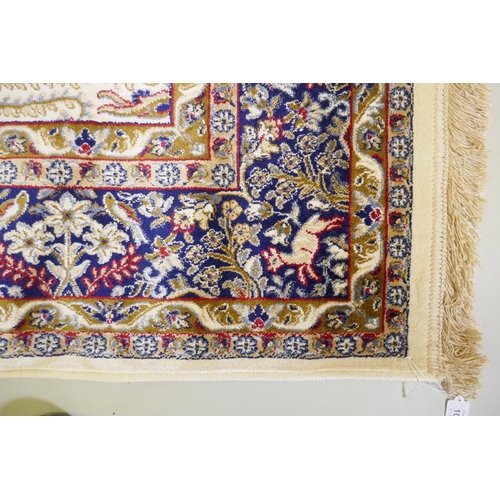 1050 - An ivory ground Kashmir full pile rug with tree of life design with blue borders, 158 x 234cm