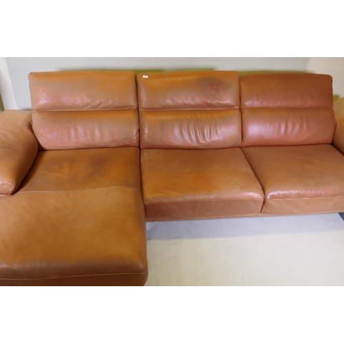 1051 - A Natuzzi leather corner sofa in two sections, with adjustable arms and backs, 316 x 160 x 90cm with... 