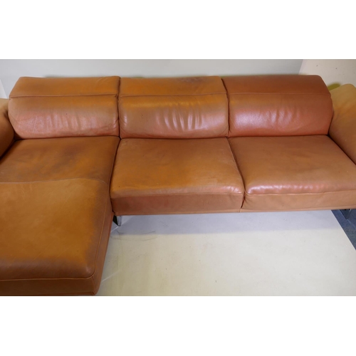 1051 - A Natuzzi leather corner sofa in two sections, with adjustable arms and backs, 316 x 160 x 90cm with... 