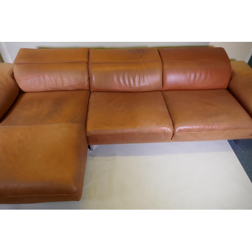 1051 - A Natuzzi leather corner sofa in two sections, with adjustable arms and backs, 316 x 160 x 90cm with... 