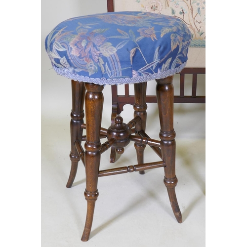 1055 - A Victorian beech wood stool, raised on sabre supports, 55cm high, another carved with an heraldic l... 