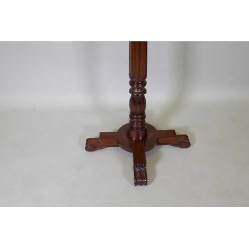 1059 - A Harrods Victorian style mahogany coat stand, with revolving brass hooks, 175cm high