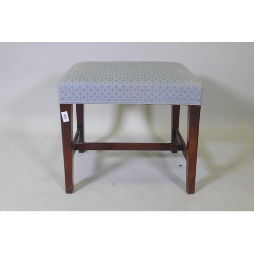 1062 - A C19th mahogany stool, raised on square tapering supports united by an H stretcher, 51 x 44 x 46cm