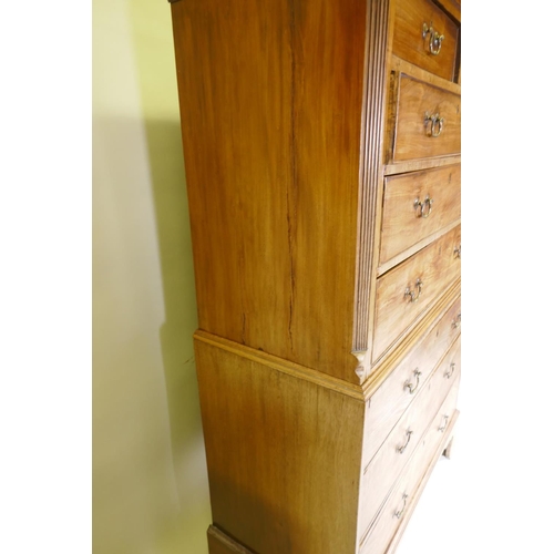 1069 - A Georgian mahogany chest on chest, the upper section with dentil cornice and canted and reeded corn... 