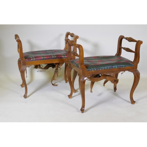 1072 - A pair of walnut stools/window seats with carved decoration, raised on cabriole supports, 66 x 43 x ... 