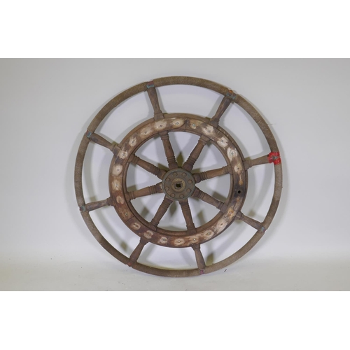 1074 - A vintage teak ship's wheel, 80cm diameter