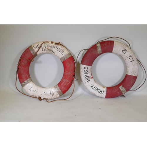 1076 - A pair of Trinity House life buoys, 80cm diameter