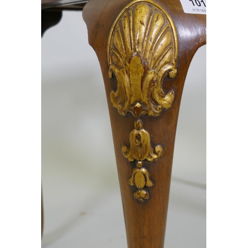 1093 - A Georgian style walnut stool with carved and parcel gilt decoration and cane seat, 56 x 41cm, 45cm ... 