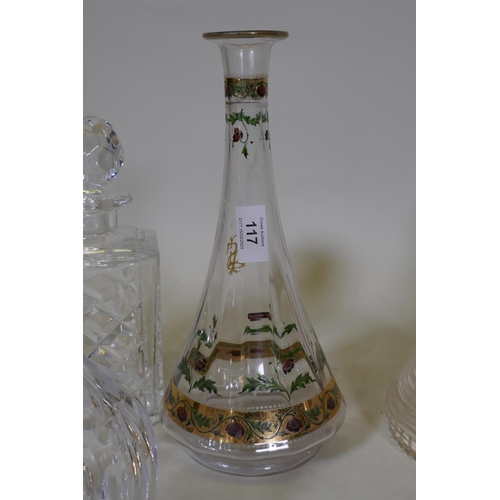 117 - An antique glass carafe with painted gilded decoration, 30cm high, a C19th cut glass ship's decanter... 