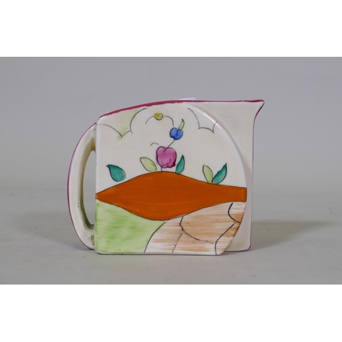 12 - A Clarice Cliff Bizarre Stamford shape milk jug, Idyll pattern decoration, marked to base, 6.5cm hig... 