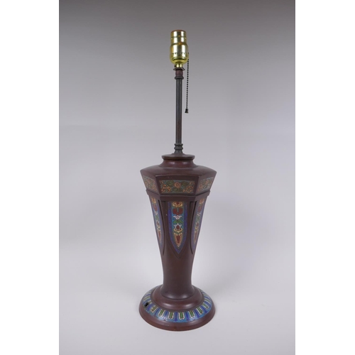 121 - A Chinese bronze lamp with decorative cloisonne panels, 58cm high