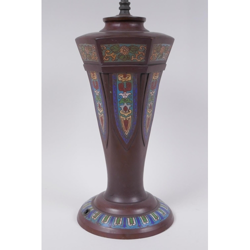 121 - A Chinese bronze lamp with decorative cloisonne panels, 58cm high