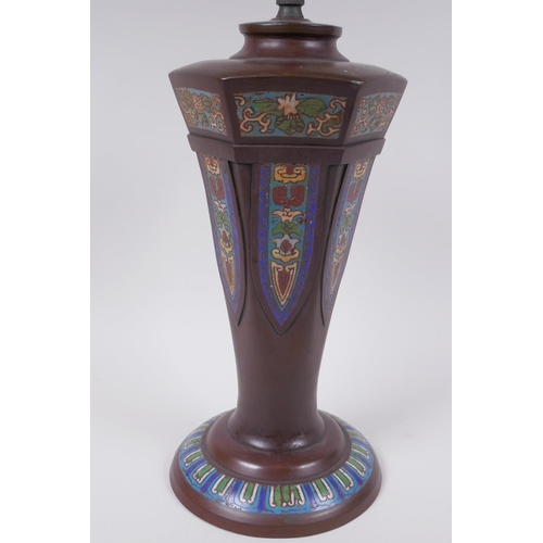 121 - A Chinese bronze lamp with decorative cloisonne panels, 58cm high