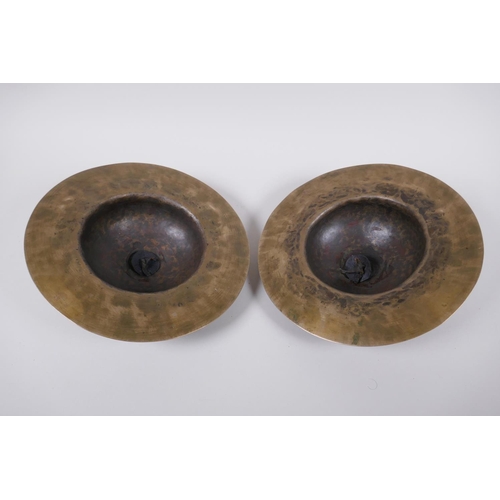 125 - A pair of Tibetan brass ceremonial 'Rol Mo' cymbals, 24cm diameter