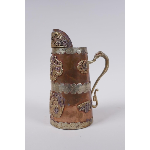 133 - A Chinese copper jug with white and gilt metal decorative mounts depicting dragons and Buddhist symb... 