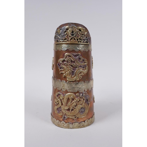 133 - A Chinese copper jug with white and gilt metal decorative mounts depicting dragons and Buddhist symb... 