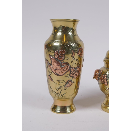 140 - A pair of Japanese brass spill vases with copper inlaid bird and prunus blossom decoration, and a ma... 