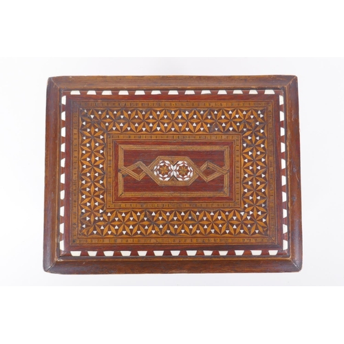 14 - An antique mahogany stand in the form of a table, with sadeli inlaid decoration to top and turned su... 