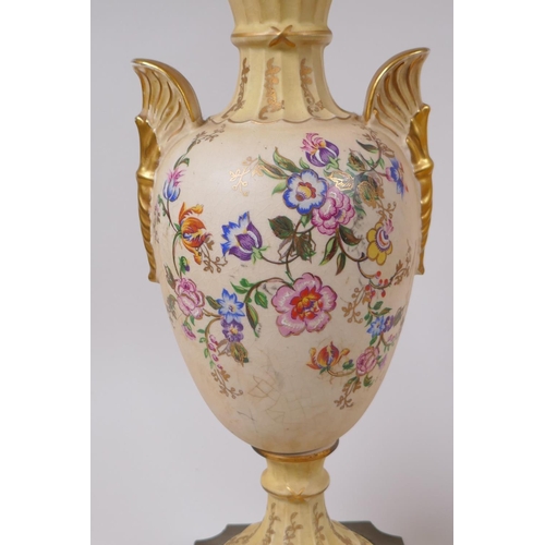 144 - A pair of continental porcelain urn shaped table lamps with gilt metal mounts and polychrome floral ... 