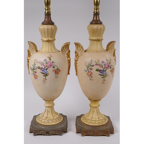 144 - A pair of continental porcelain urn shaped table lamps with gilt metal mounts and polychrome floral ... 