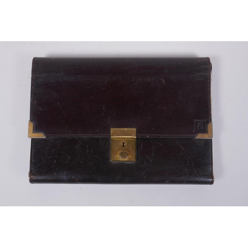 152 - An Italian Fendi leather document wallet, a snake skin wallet and two imitation animal skin purses, ... 