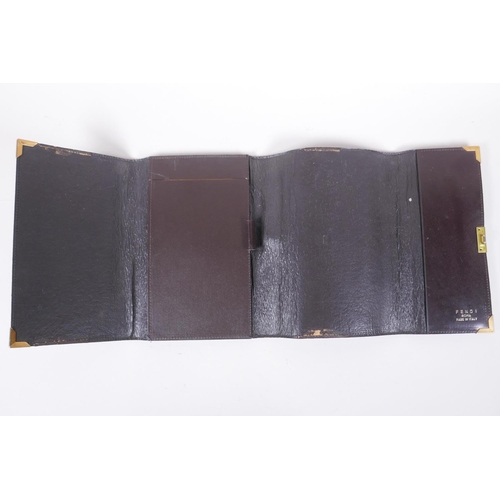 152 - An Italian Fendi leather document wallet, a snake skin wallet and two imitation animal skin purses, ... 