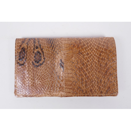 152 - An Italian Fendi leather document wallet, a snake skin wallet and two imitation animal skin purses, ... 