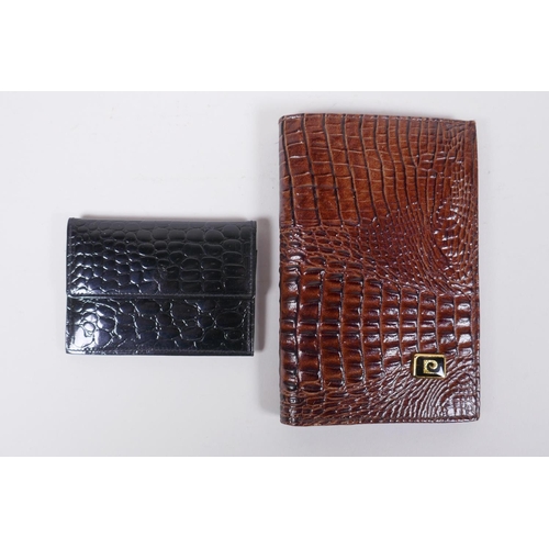 152 - An Italian Fendi leather document wallet, a snake skin wallet and two imitation animal skin purses, ... 