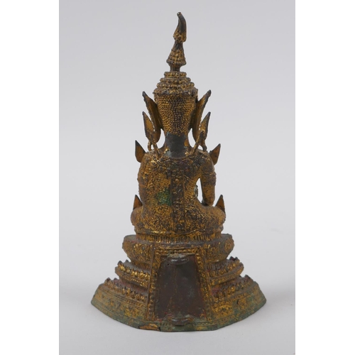 155 - A Thai gilt bronze figure of Buddha, 16cm high