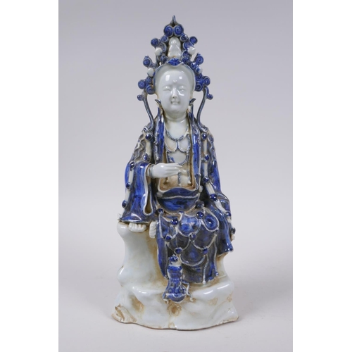 158 - A Chinese blue and white porcelain figure of Quan Yin, 29cm high