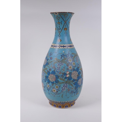 16 - A Japanese Meiji period cloisonne on porcelain pear shaped vase with floral and butterfly decoration... 