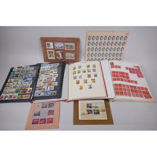 161 - A quantity of early C20th Cinderella stamps, an album of C19th and C20th USA stamps and postage dues... 