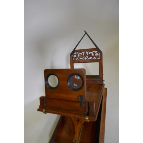 179 - A good C19th mahogany stereoscope with pierced fret decoration, in the manner of Newton & Co, 39... 